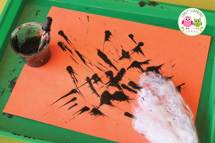 Painting with your spider web painting for a wonderful art activity. 