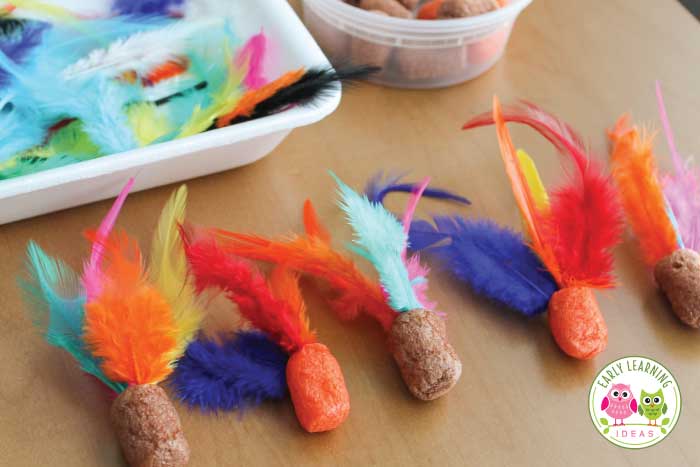 Have kids poke the feathers into the foam for this feather fine motor activity. 