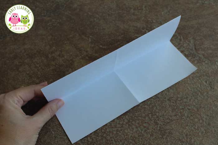 Folding your tiny blank book for your preschool writing centers. 