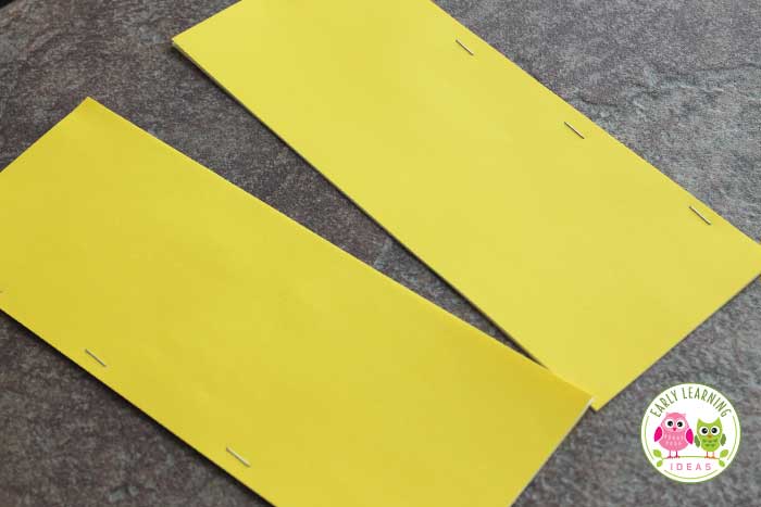 After you stapled, cut the paper down the middle for your little blank books.  