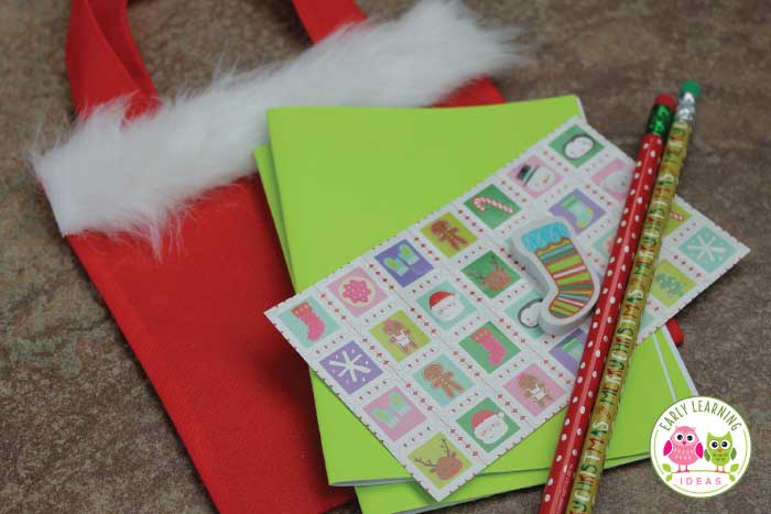 Check out these fun easy to make DIY Christmas gift bags that you can make for your kids. There is no need to look for more ideas, these are perfect for a class gift or holiday party goody bag or favor. Check out the tutorial for the directions...they are simple. Your kids will love these homemade little Santa bags. #preschool #Christmasactivities #christmascrafts #christmasintheclassroom