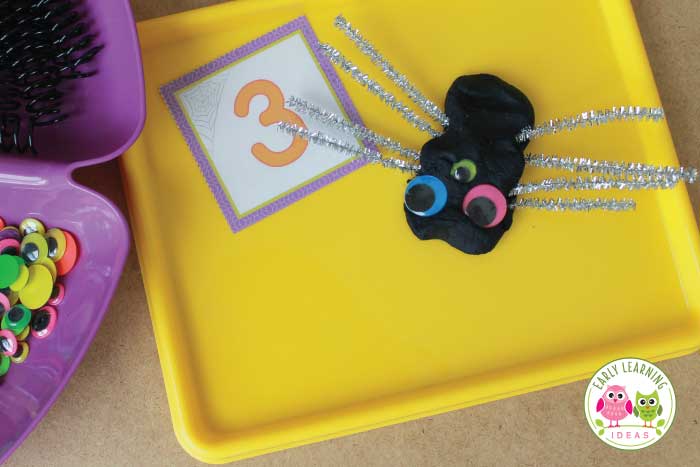 Add pipe cleaners to your activity tray for your spider playdough activity center.