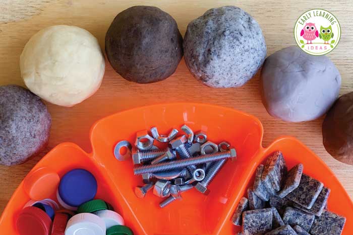 Adding supplies to your construction themed playdough.