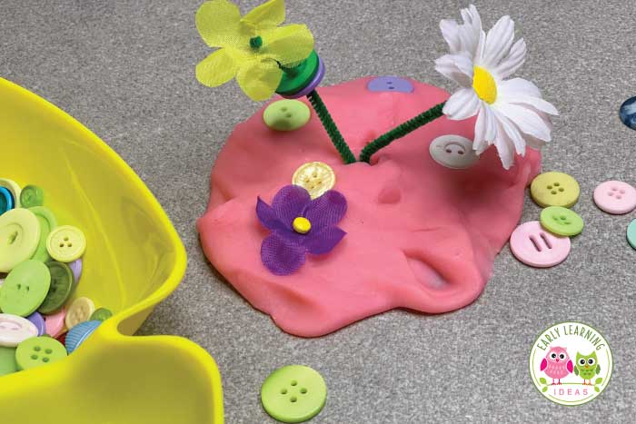 Now sit back and watch your kids create with their flower playdough tray.