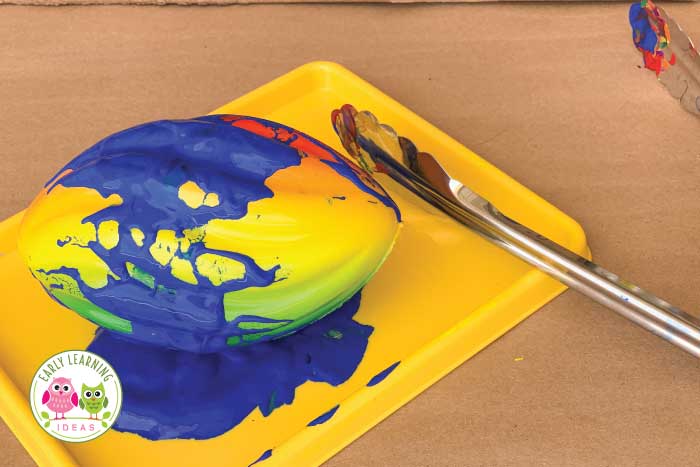 Add paint directly to the ball and then paint for your painting with balls activity. 