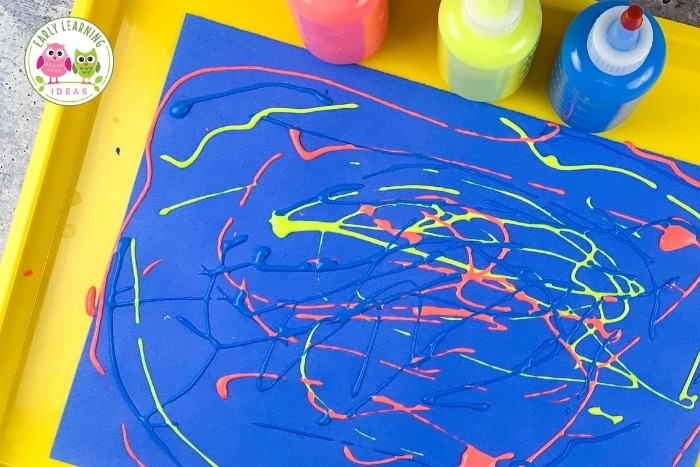 Try out these fun & easy painting activities to promote fine motor skills. These ideas are perfect for preschool art projects. Help your preschoolers strengthen hand muscles. These open-ended projects are perfect for preschool, pre-k, kindergarten, occupational therapy classrooms or to do at home. From squeezing a bottle to pinching a clothespin, your kids will love these process art activities. Click to lean how painting can help fine motor skills.