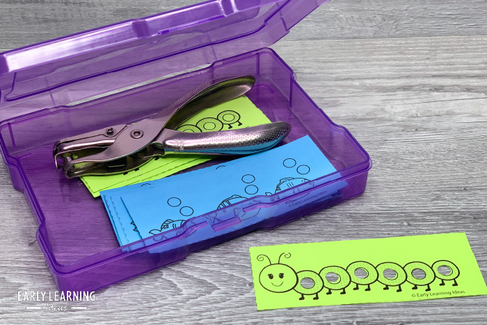 caterpillar hole punch activity in a plastic box