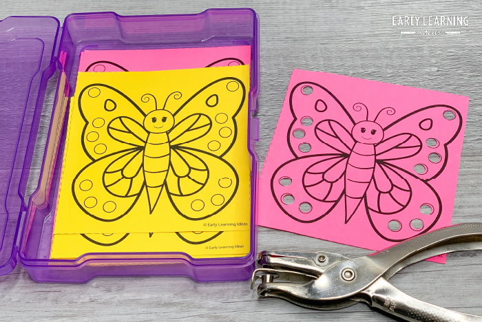 butterfly fine motor activity with a hole punch in a box