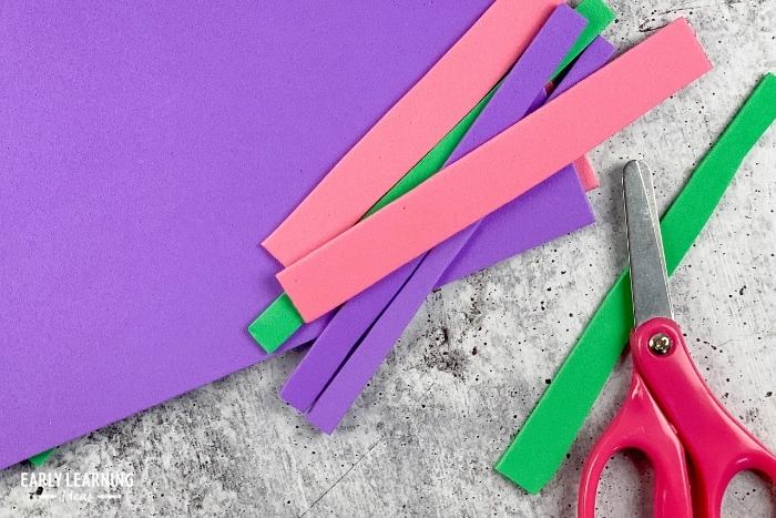 Use craft foam or scrap paper for cutting practice - a fun idea for cutting activities for preschoolers.
