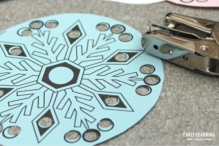 snowflake fine motor activity with holepunch
