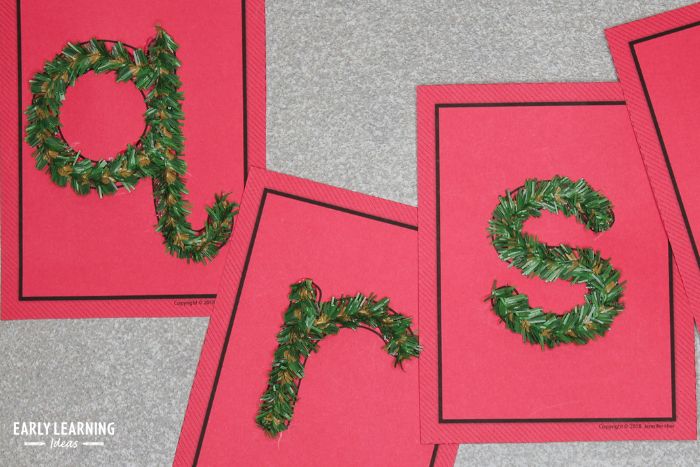 Christmas tree decoration as part of your tactile letter activity.  