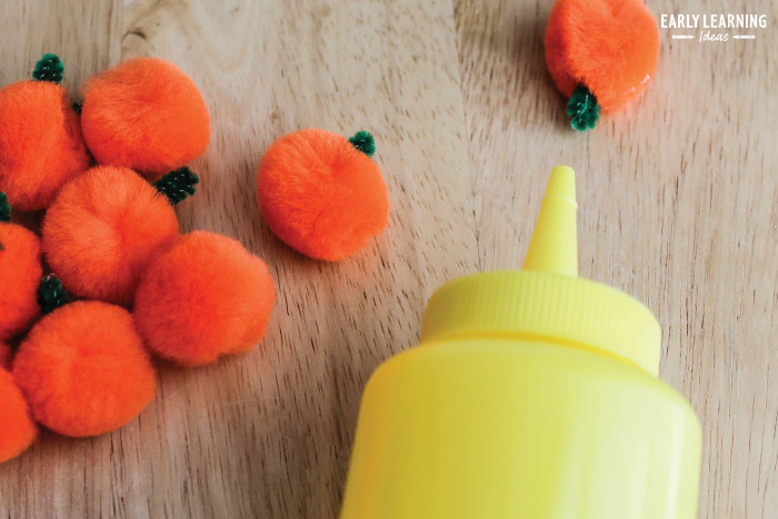 Use a plastic squeeze bottle to blow pumpkins across the floor