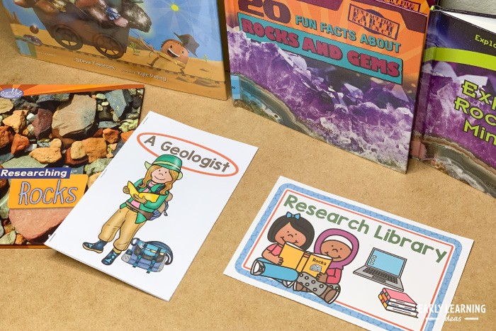 learn about geologist with books in preschool dramatic play center