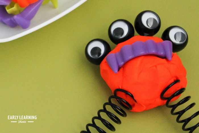 playdough monster activity with multiple eyes and fangs