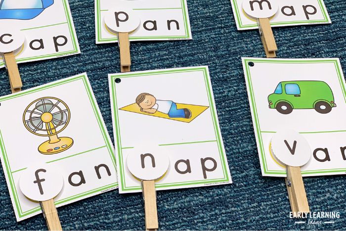 A CVC beginning sounds clip cards set being used for letter sound activities
