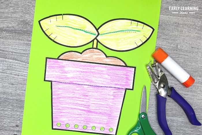 Easy Earth Day crafts for preschoolers - a cut and paste seedling craft that will help build fine motor skills.