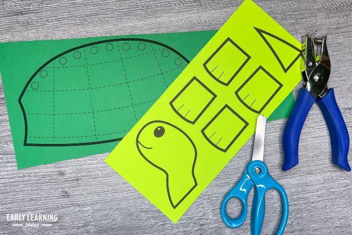 pieces of a printable turtle craft and fine motor activity that is an example of pond crafts for preschoolers.