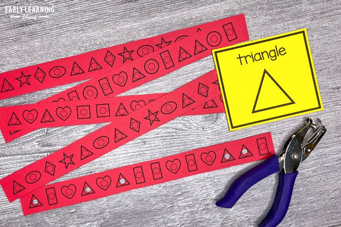 shapes hole punch strips with a triangle shape id card.