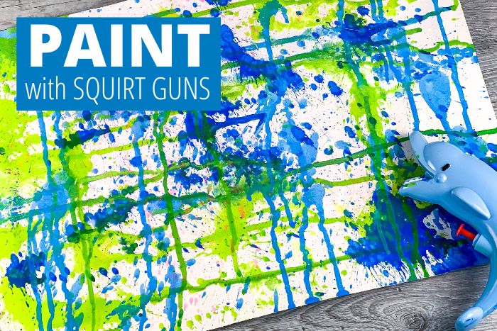 squirt gun painting for simple summer art projects for preschoolers
