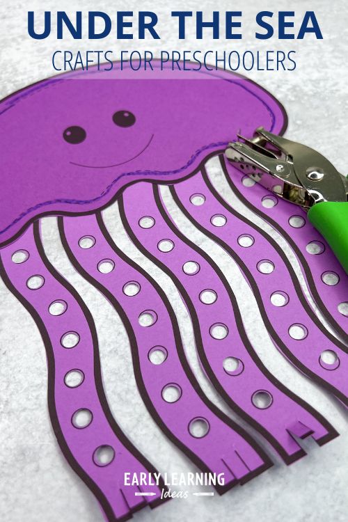 a jellyfish craft with a hole punch is an example of under the sea crats for preschoolers and ocean theme fine motor activities for summer