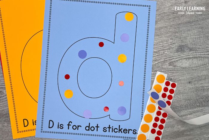 An alphabet printable with the letter d that says d is for dot sticker - an example of dot sticker activities for preschoolers.