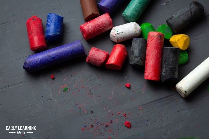 a bunch of colorful broken crayons used for drawing to build pincer grasp