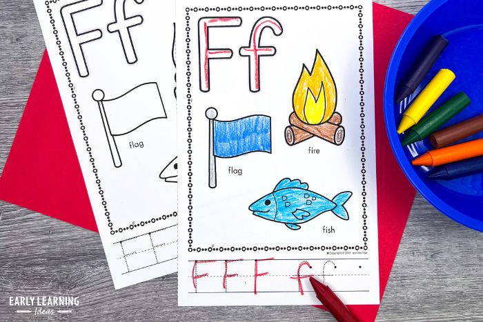 A small alphabet tracing sheets.  A letter "f" worksheet with pictures of a flag, fire, and a fish.  Uppercase and lowercase letters have been traced with a red crayon.