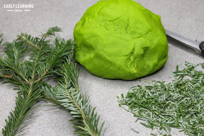 Use real tree branches in your sensory Christmas tree playdough for kids