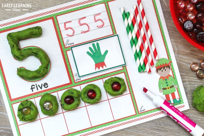 Use playdough mats for an added learning activity with your Christmas tree playdough.