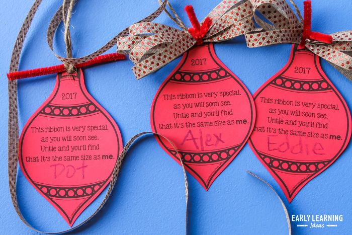 printable ornaments with ribbon as a preschool Christmas gifts for parents - A length of ribbon representing the height of a child is attached to the ornament.
