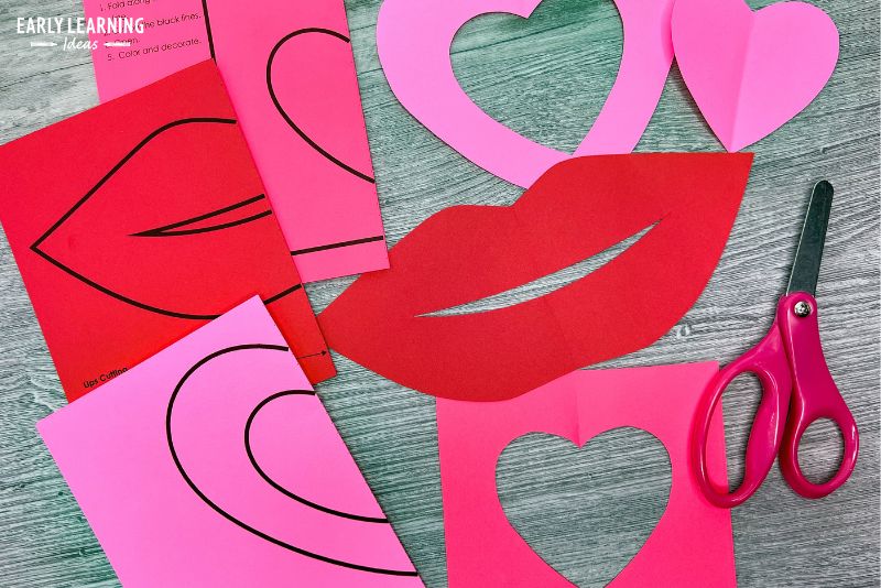 Valentine cutout crafts printed on red and pink paper.