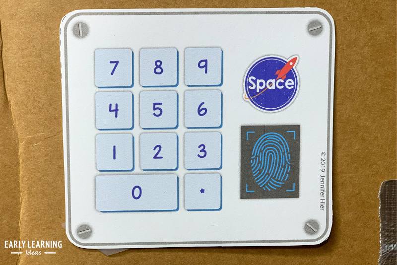 A printable fingerprint and number keypad for a space dramatic play area
