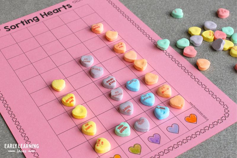 Conversation hearts are sorted by color on a printable graph