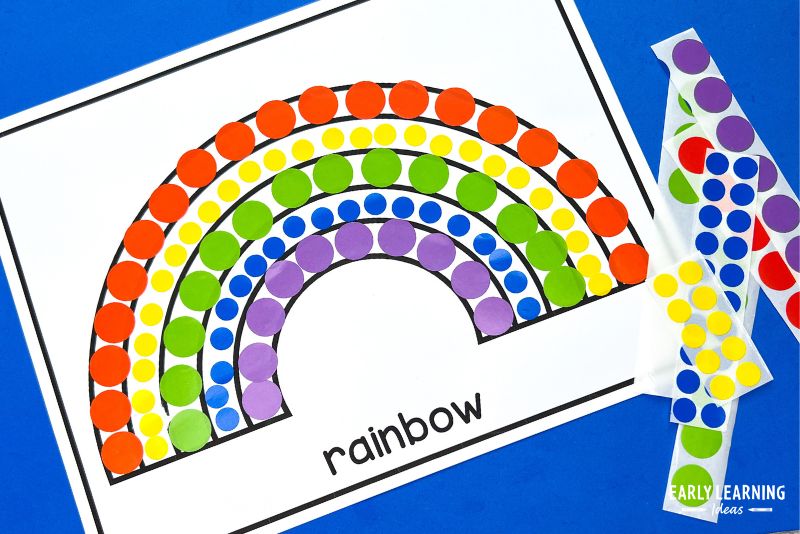 A rainbow craft for preschool kids made with dot stickers