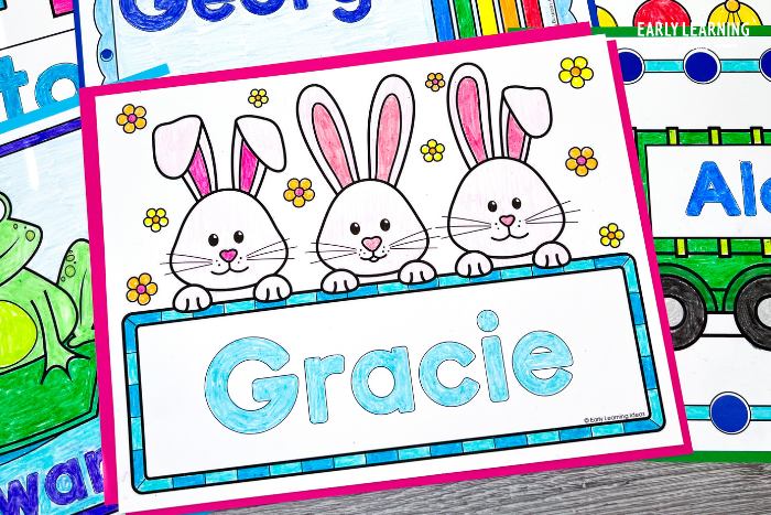 Printed custom name coloring page with 3 Easter bunnies on it and the name Gracie