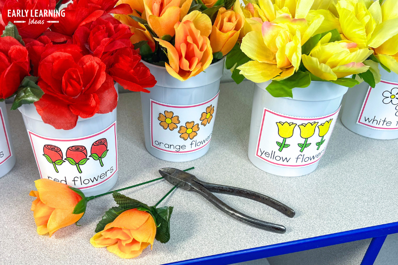 Silk flowers with snips used for cutting the stems.