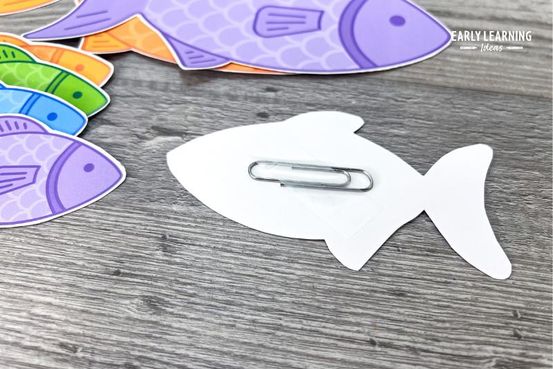 paperclip taped to the back of a printable fish.