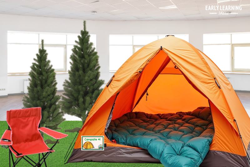 camping dramatic play area with a tent, christmas trees, a sleeping bag, and camp chair
