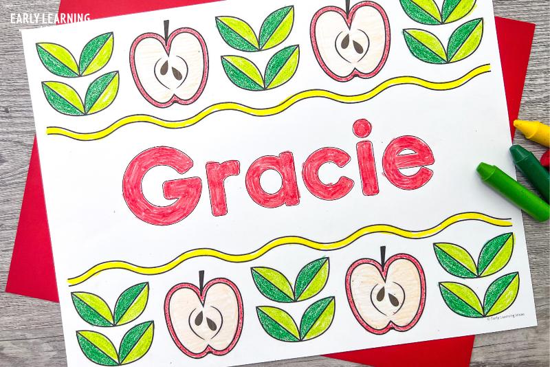 An apple theme name coloring page with the name Gracie on it - and example of easy apple crafts for preschoolers