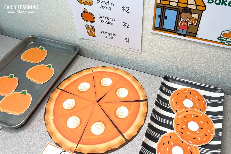 printable pumpkin cookies, pumpkin pie, and pumpkin donuts in a pumpkin bakery dramatic play center.