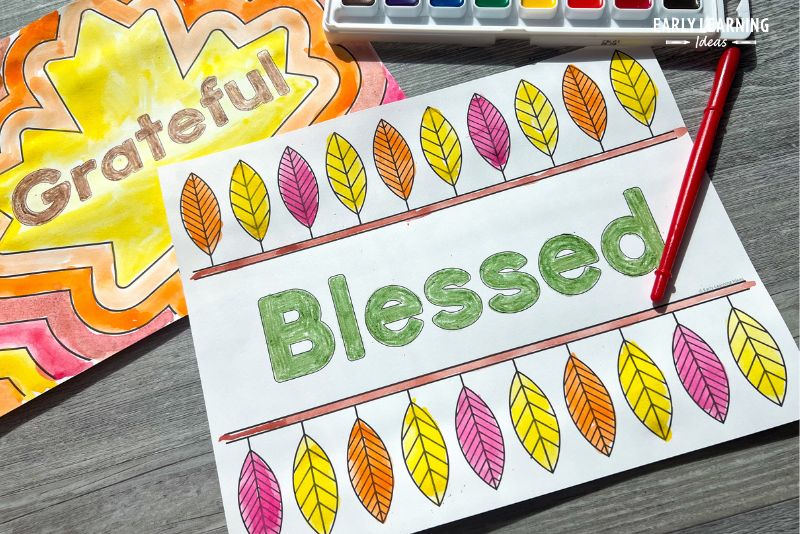 Name coloring pages with watercolor paints. The words "blessed" and 'Grateful" are on the pages for a simple Thanksgiving craft for preschool kids