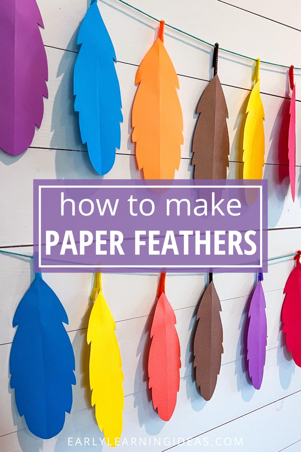 how to make a garland with paper feathers - colorful feathers hanging on a white background.