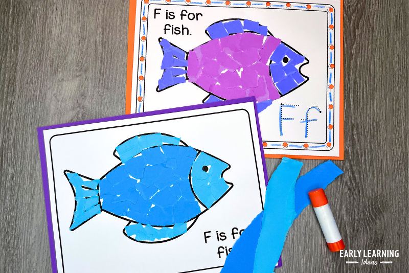 Fish crafts for the letter F Two torn paper crafts are shown with paper and a glue stick
