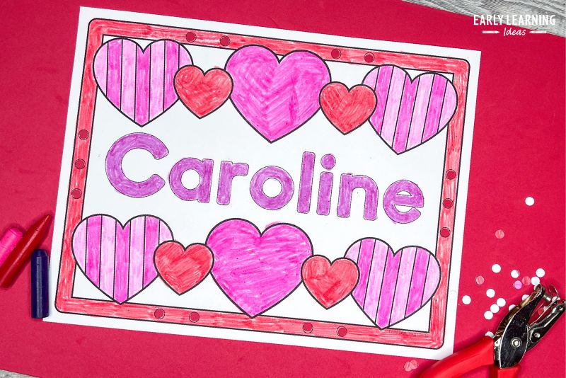 Valentine's Day name coloring sheet with a hole punch border