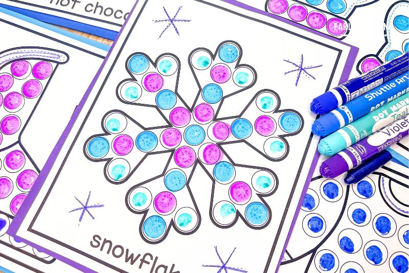 winter snowflake dot marker activity sheet shown with dot markers.