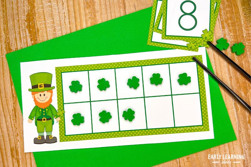shamrock mini erasers in a ten frame with a number 8 card and training chopsticks - a St. Patricks day math and fine motor activity.