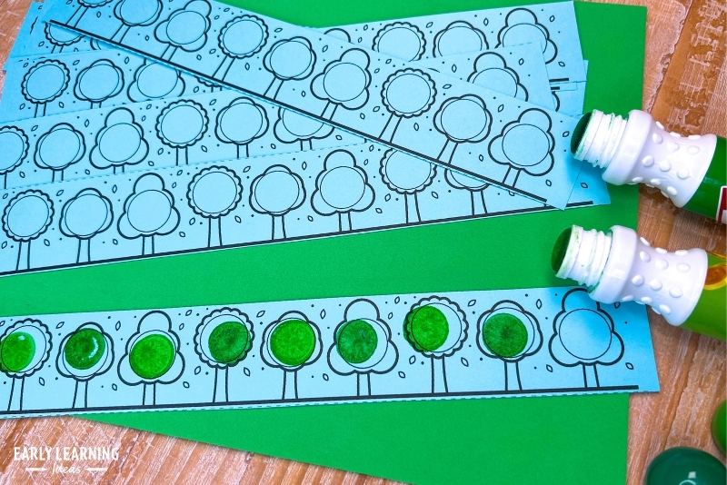 Dot marker strips with trees on them shown with green dot markers.
