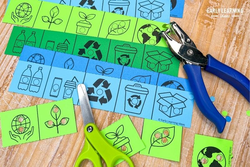 Earth Day hole punch and cut strips - an example of fun Earth Day fine motor activities