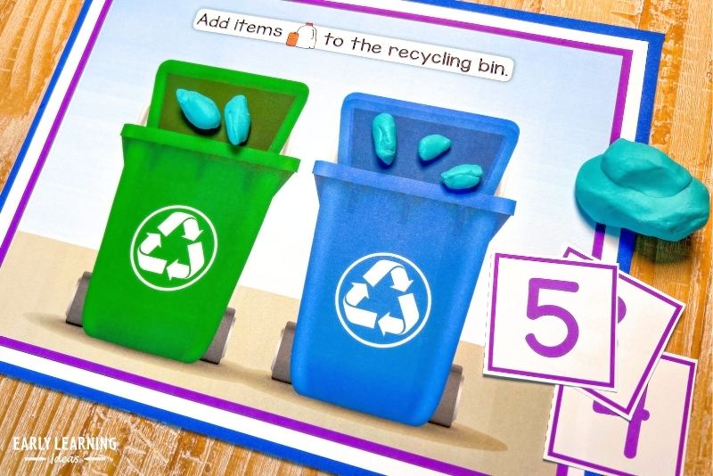 Recycling bin playdough mat, number cards, and playdough - an example of Earth Day fine motor activities for preschoolers