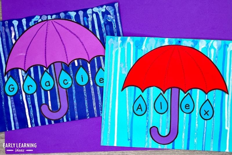 drip painting as a background for an umbrella name craft - an example of April showers crafts for kids
